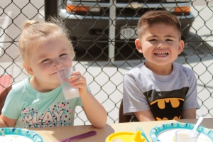 Children enjoying lunch at Florence Crittenton High School’s early learning center